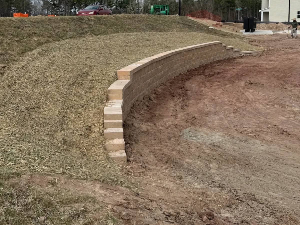 Block retaining wall with the slope strawed